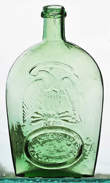 American Double Eagle “CUNNINGHAM & CO PITTSBURGH” flask,  yellowish green