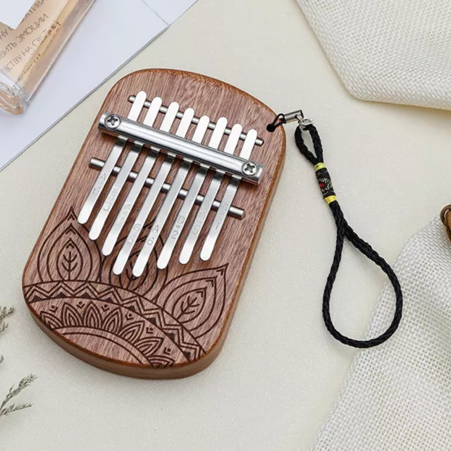 Mini piano pouce Kalimba en bois transparent 8 touches beau son design portable