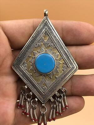 Antique handmade old silver pendant with synthetic turquoise stone