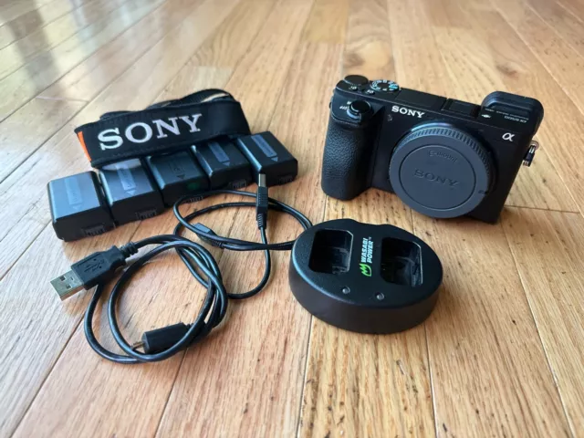 Sony Alpha a6500 Mirrorless Digital Camera Body + 5 Batteries + Charger + Strap
