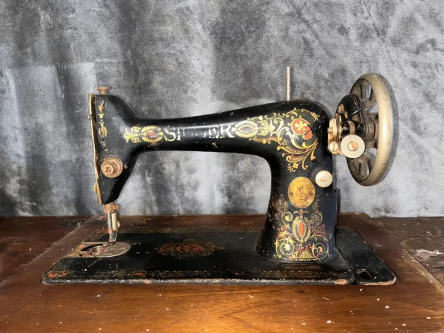 Vintage Singer Sewing Machine in cabinet