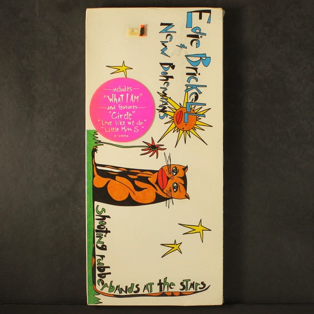 EDIE BRICKELL & NEW BOHEMIANS shooting rubberbands at the stars