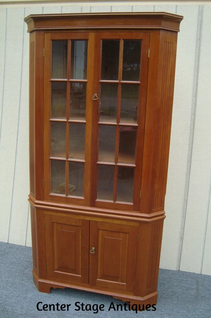 62065    2 pc. Solid Cherry Corner China Cabinet Curio