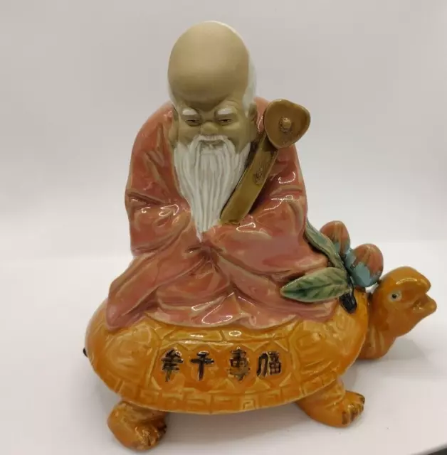 Chinese Porcelain Mud Man Xing Lao God of Longevity on a Turtle Statue Figure