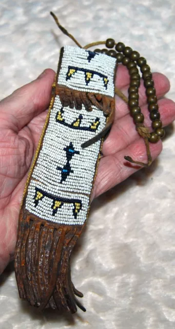 Native American Ute 1880-1890, Sinew sewn, Wet Stone Case w/strng of brass beads