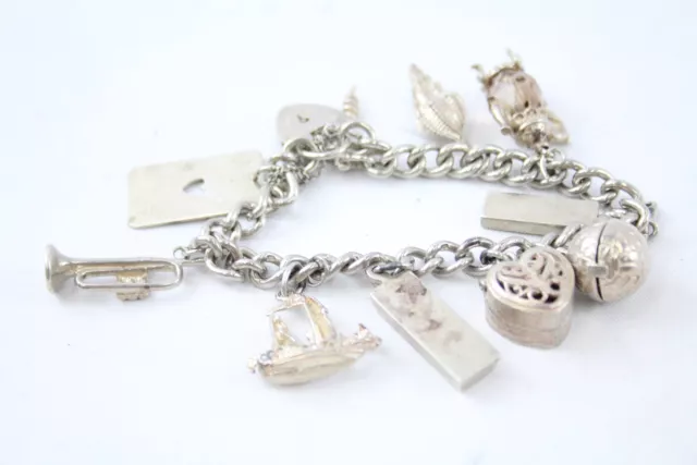 Sterling Silver Charm Bracelet Heart Gate Ship Shell Ingots x 1 (54g)