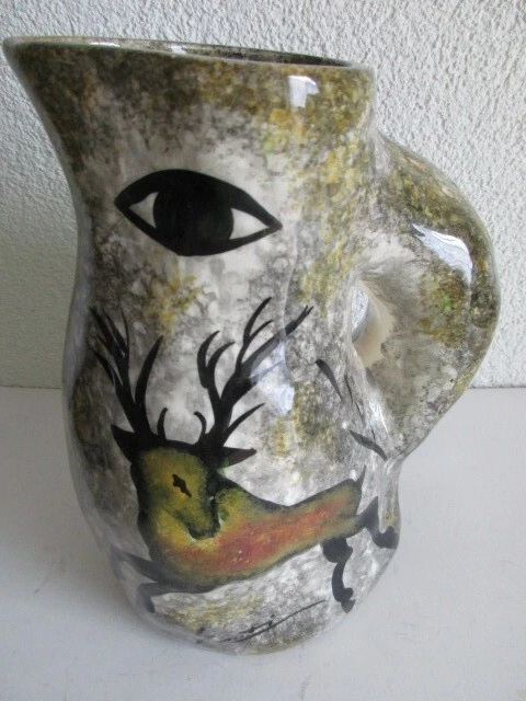 PICHET ANNEES 50 CERAMIQUE DECOR CERF OEIL ET ART RUPESTRE HAUT 17.cm