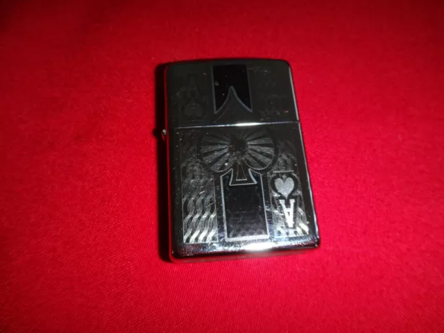 Year 2012 High Polish Zippo Lighter with Ace of Spade & USA Flag Symbol Sticker