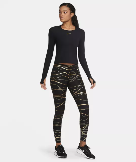 Nike gold online and black leggings