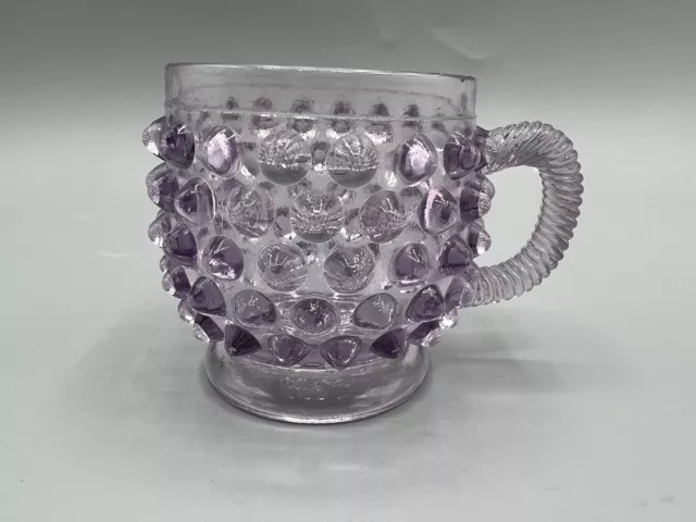 https://www.picclickimg.com/T7IAAOSwMQ9kcCka/Pointed-Hobnail-Cup-Sun-Turned-Purple-Glass.webp