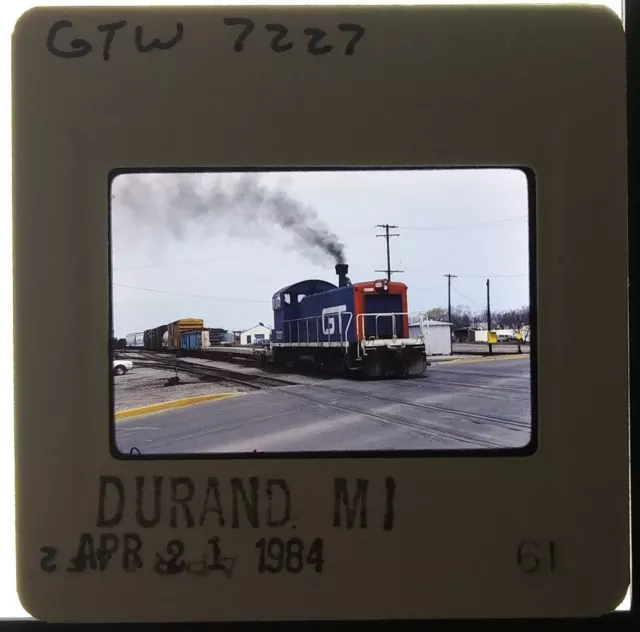 Orig Slide GTW Grand Trunk Western SW1200 7227 Action Durand Mich 21Apr1984