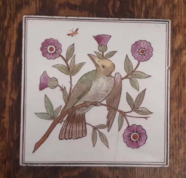 Antique Victorian aesthetic hand painted bird tile about 1880