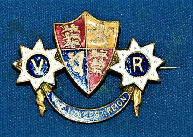 An enamelled Queen Victoria Royal Arms initial pin, Diamond Jubilee, tiny damage
