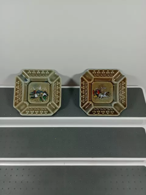 2 Wade Irish Porcelain Square Ashtrays. 1 Green, 1 Blue Coloured Back.