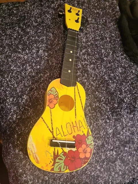 First Act Discovery Child 20" Guitar 4 String w/Hawaii Aloha Design Needs Work