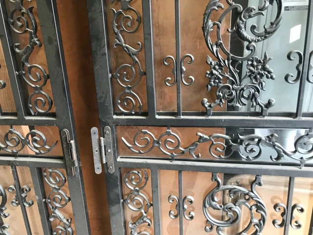 antique ornate screen doors, 80x36  double standard opening, with glass inserts.