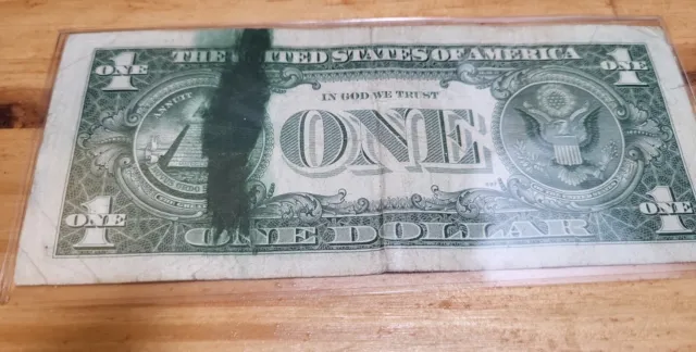 1 dollar bill. Error. Ink Smear