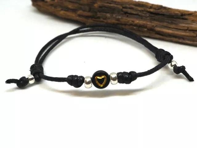 Pulsera Corazón con hilo negro de algodón ajustable