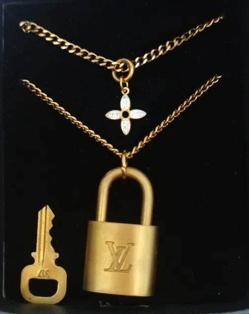 Authentic Louis Vuitton Gold Lock & Key with necklace Vintage flower pendent
