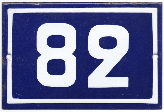 Old blue French house number 82 B door gate wall fence street sign plate plaque