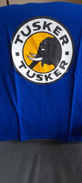 Tusker Beer t-shirt 💙  size XL. New  Kenya HARIASTAMP Baada ya kazi...