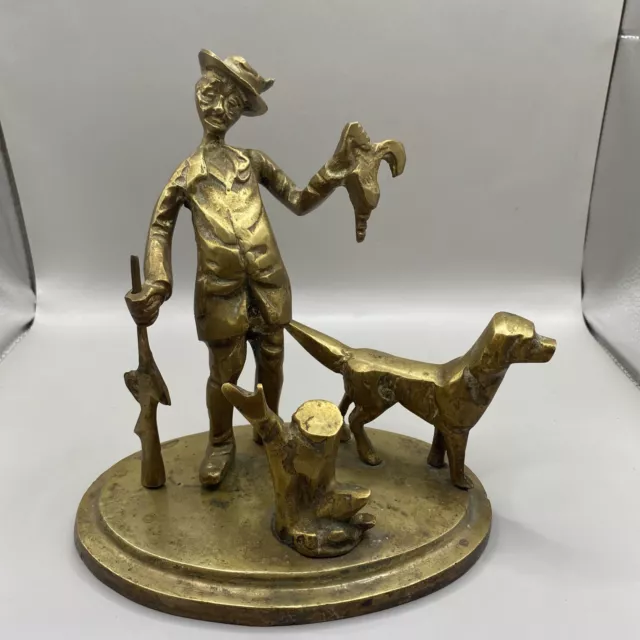 An Antique Heavy Cast Brass Figurine Of A Drunken Hunter. Tipsy Hunter Doorstop