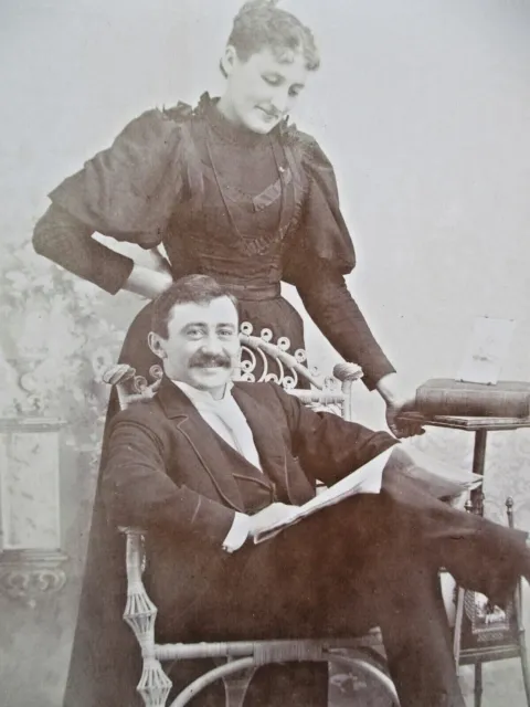 Antique Cabinet Card Photograph Smiling Man in Chair and His Wife Victorian USA