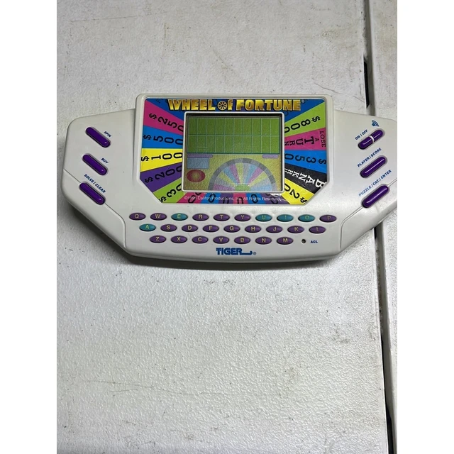 VINTAGE WHEEL OF Fortune Tiger Handheld Game With Cartridge 1995 20.00