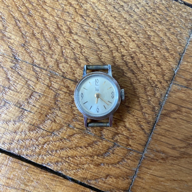 Montre Vintage LIP Made In France - Boîtier Plaqué Or, Cadran Blanc, Bracelet Cuir Marron, Fonctionnelle