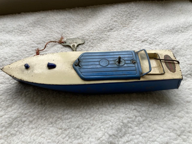 A Hornby clockwork No. 2 speedboat 'Swift', with yellow painted hull, length approx 31cm