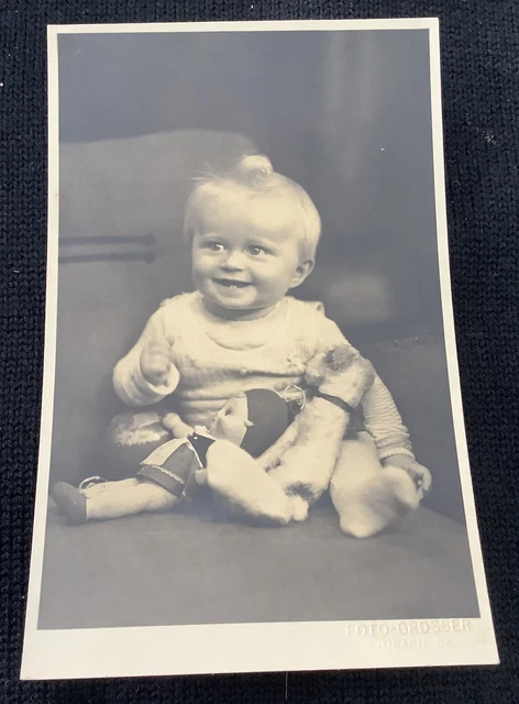 RPPC Real photo Postcard baby toy doll stuffed animal Russell terrier dog vintag
