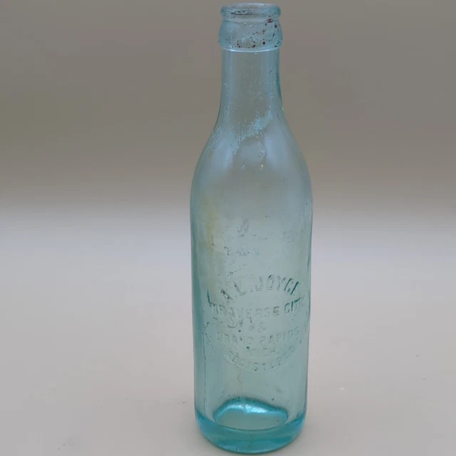 ANTIQUE A L JOYCE TRAVERSE CITY & GRAND RAPIDS 8oz Aqua Crown Top Soda