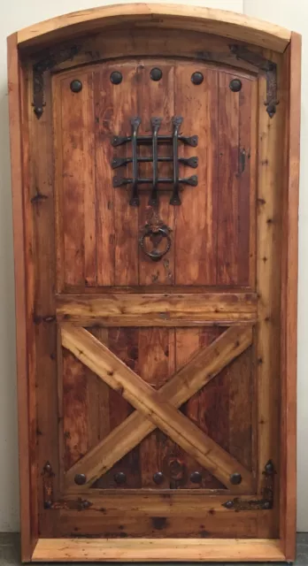 Rustic reclaimed lumber Eyebrow arch door solid wood story book castle winery