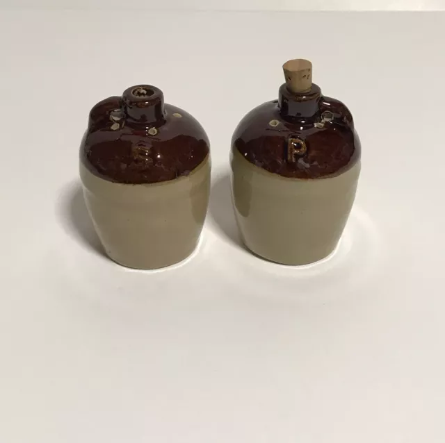 https://www.picclickimg.com/TPgAAOSwtGFkSWDr/Vintage-Small-Brown-Ceramic-Glazed-Corked-Whiskey-Jugs.webp
