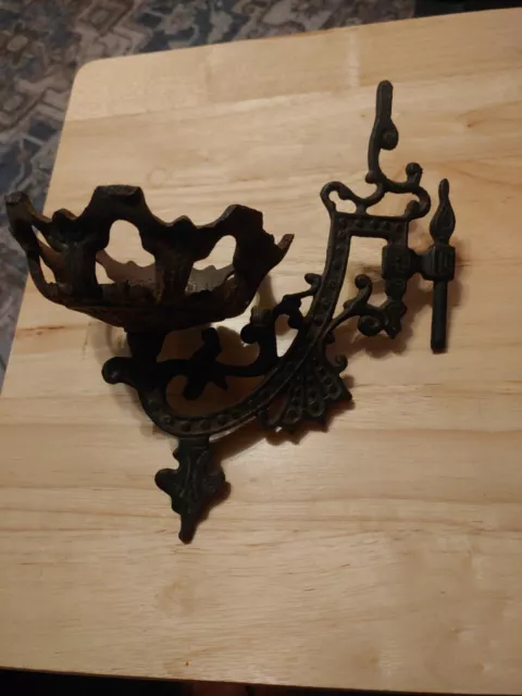Antique cast iron wall sconce swing arm oil lamp holder. No wall mount