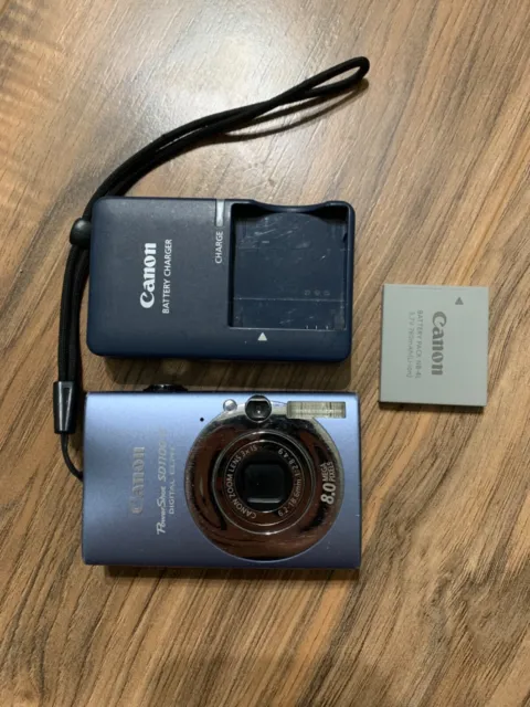 Canon Powershot SD1100 IS cámara azul TIENE PROBLEMA NO ENFOCA