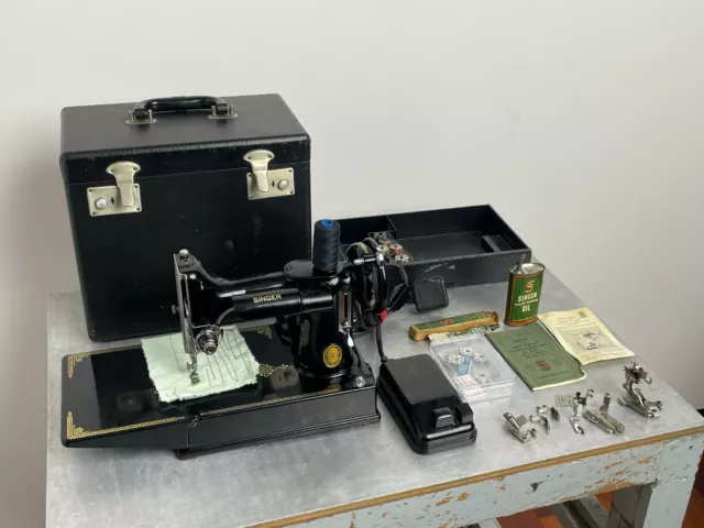 Vintage 1951 Singer Featherweight 221 Sewing machine with many accessories