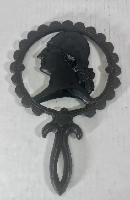 Vintage Cast Iron trivet female head Seasoned  X 3 has 3 feet