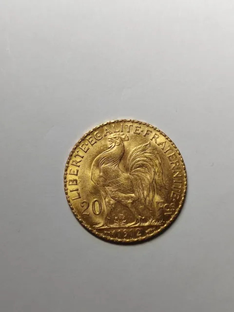 20 FRANCS OR MARIANNE 1912Cette authentique monnaie en Or,