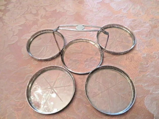 Antiques Set of Four Webster Sterling Silver and Glass Coasters and a Holder.