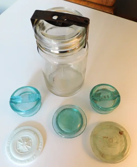 4 Old Fruit Jar Lids, 1 Hero Porcelain Liner & 1 Safety Valve Clamp w/Jar & Lid
