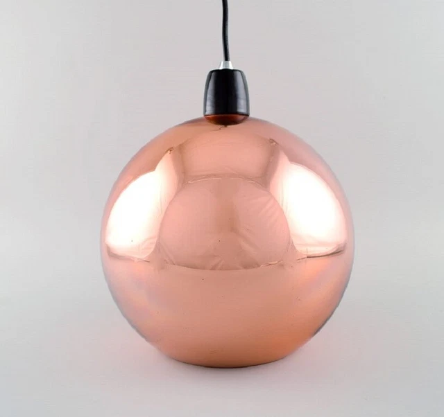 Tom Dixon (b. 1958), British designer. Round copper coloured ceiling pendant.