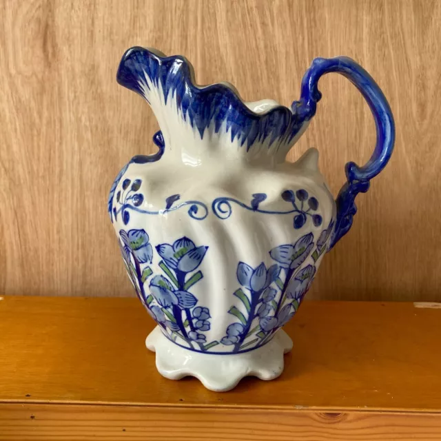 A pretty Victoria Ware Ironstone Blue And White Floral Jug 21cm tall