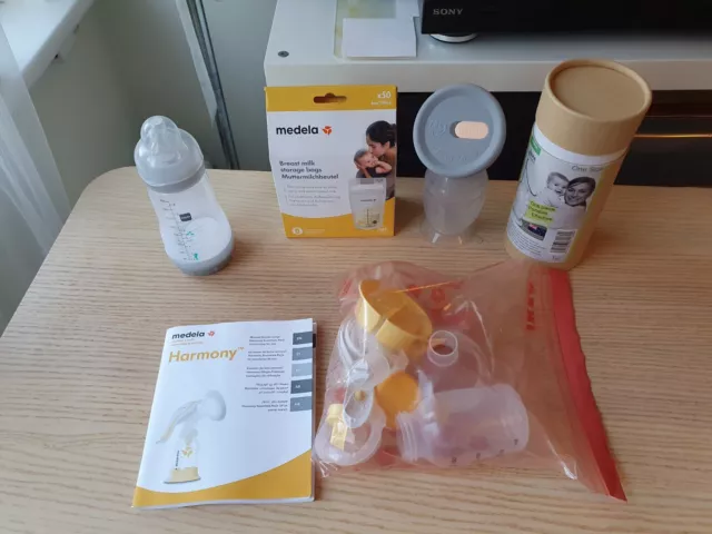 Never Used Mendela Breastfeeding Hand Pump & Used Hakaa Pump Bundle