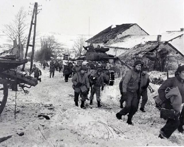 U.S. Troops move through village during Battle of the Bulge 8x10 WWII Photo 145a