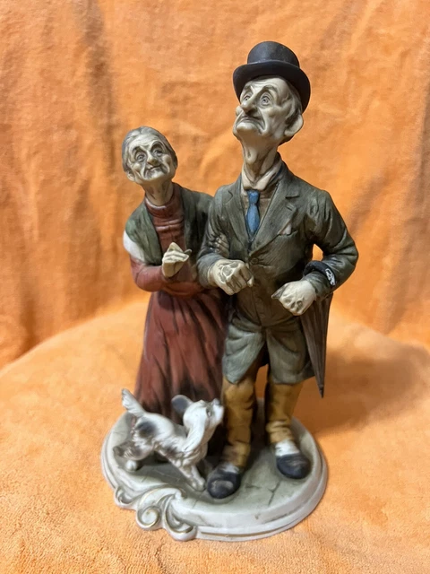 Vintage “Elderly Dressed Up Couple Walking Their Puppy” Ceramic Figurine