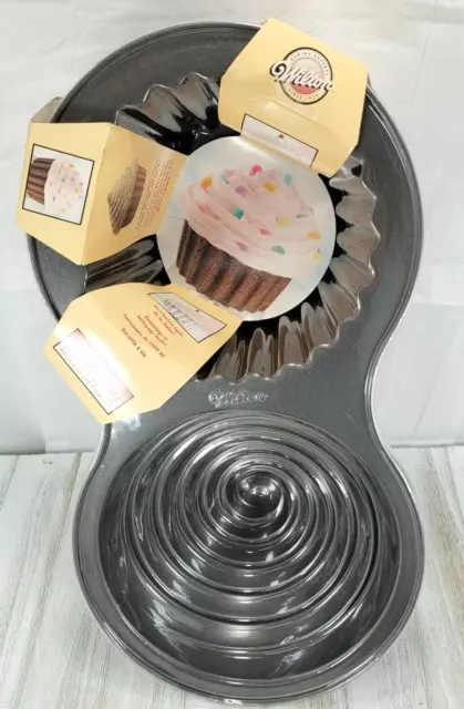 https://www.picclickimg.com/TZwAAOSwdYVhtzt3/Wilton-Giant-Cupcakes-Pan-Two-Sided-Cup-Cake.webp