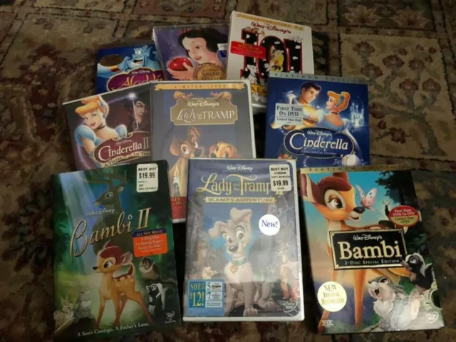 Walt Disney's dvds 10 new Snow White Aladdin, Cinderella, Bambi , Pinocchio