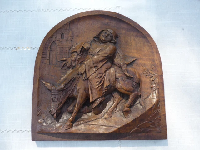 Bas-relief sculpté scène médiévale Moine âne