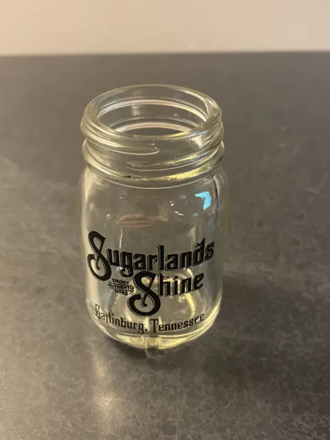 https://www.picclickimg.com/Tc0AAOSwpgliiq9c/Sugarlands-Shine-Mason-Jar-Shot-Glass-Gatlinburg-Tennessee.webp